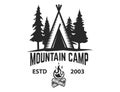 Mountain camp emblem template. Camping tent with trees and campfire. Design element for logo, label, emblem, sign. Royalty Free Stock Photo