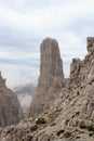 Mountain Campanile Basso in Brenta Dolomites with clouds, Italy