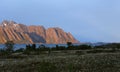 Mountain chain and Henningsvaer in Lofoten midnight sun