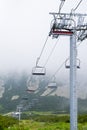 Mountain chairlift. An elevated passenger ropeway. Royalty Free Stock Photo