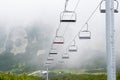 Mountain chairlift. An elevated passenger ropeway. Royalty Free Stock Photo
