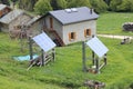 Mountain chalet with solar panels Royalty Free Stock Photo