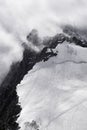 Mountain in Chamonix in a bad weather with climbers