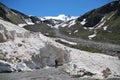 mountain climber descending on mountainbike after skiing Mt. Gabler