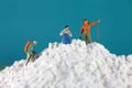 Mountain climber figures on flour