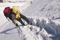 Mountain climber on snowy slope