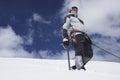 Mountain Climber On Snowy Slope With Safety Line Attached Royalty Free Stock Photo