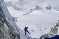 Mountain climbers climbing the snow covered Alps in Mont Blanc Massif Royalty Free Stock Photo