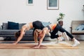 Mountain climbers exercise. Mother and daughter working out at home. Royalty Free Stock Photo