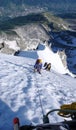 Mountain climbers on a steep climbing route in the French Alps in Chamonix