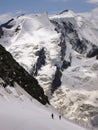 Mountain climbers on a steep glacier near Grindelwald in the Swiss Alps Royalty Free Stock Photo