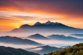 Mountain cloud and foggy at morning time with orange sky, sunrise beautiful landscape Royalty Free Stock Photo