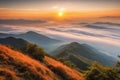 Mountain cloud and foggy at morning time with orange sky, sunrise beautiful landscape Royalty Free Stock Photo