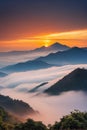 Mountain cloud and foggy at morning time with orange sky, sunrise beautiful landscape Royalty Free Stock Photo