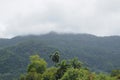 Mountain, clouds and haze.