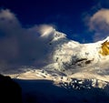 Mountain between clouds