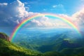 Mountain with colorful rainbow in cloudy sky over field. Nature landscape after storm. Spring morning