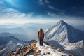 Mountain conqueror Hiker on top of the snow covered peak