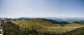 Mountain cottage hut or house on hill Velika Planina alpine meadow landscape. Eco farming. Kamnik Alps, Slovenia. Big Plateau. Pan Royalty Free Stock Photo