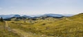 Mountain cottage hut or house on hill Velika Planina alpine meadow landscape. Eco farming. Kamnik Alps, Slovenia. Big Plateau. Pan Royalty Free Stock Photo