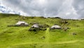 Mountain cottage hut or house on idyllic hill Velika Planina Royalty Free Stock Photo