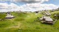 Mountain cottage hut or house on idyllic hill Velika Planina Royalty Free Stock Photo