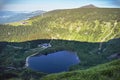 Mountain cottage, lake and mountain Sniezka