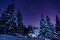 Mountain cottage . Milky Way Galaxy. Purple night sky stars above mountains Royalty Free Stock Photo