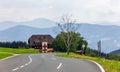 Mountain cottage by the road in the Alps, Wolfsberg area, Austria Royalty Free Stock Photo