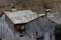 Mountain cottage with the typical roof of stone slabs in Val dAosta, Italy.