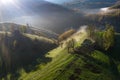 Mountain countryside homestead in the autumn. Wooden barns, aerial drone view