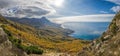 Mountain, covered with clouds against the blue sea. The picturesque bay of Laspi, Crimea seascape in autumn. seascape coast, Royalty Free Stock Photo