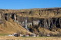 Village and a waterfall Foss a Sidu, south Iceland Royalty Free Stock Photo