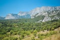 Mountain Crimea rocks and trees on slope, forest Royalty Free Stock Photo