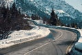 Mountain dangerous curved road in winter mountains.