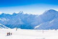 Mountain day winter. Elbrus. Men-women. snowboard and ski Royalty Free Stock Photo