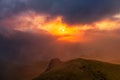 Mountain dramatic sunset in clouds Royalty Free Stock Photo