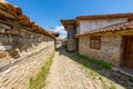 Narrow stone street in the Balkan village of Zheravna in Bulgaria Royalty Free Stock Photo