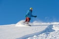 MOUNTAIN ELBRUS, RUSSIA - NOVEMBER 30, 2017: A snowboard girl wearing a sun mask and a scarf is riding down the alpine