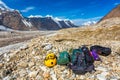 Mountain Expedition Luggage on Rocky Moraine of Glacier Royalty Free Stock Photo