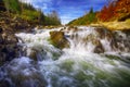 Mountain fast flowing river stream of water in the rocks Royalty Free Stock Photo