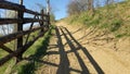 Mountain fence. Mountain rural road Royalty Free Stock Photo