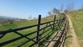 Mountain fence. Mountain rural road Royalty Free Stock Photo