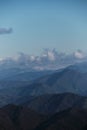 View from top to forest and high mountains of Caucasian reserve. Minimalistic nature screensaver. Mountain forests and peaks of Royalty Free Stock Photo