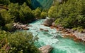 Mountain fresh and cold river in summer time under cloudy sunny blue sky Royalty Free Stock Photo