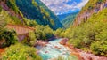 Mountain fresh and cold river in summer time under cloudy sunny blue sky Royalty Free Stock Photo