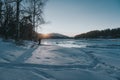 Mountain river at sunset in winter Royalty Free Stock Photo
