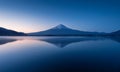 Mountain Fuji at dawn with peaceful lake reflection Royalty Free Stock Photo