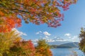 Mountain Fuji with red maple leaves or fall foliage in colorful autumn season near Fujikawaguchiko, Yamanashi. Five lakes. Trees Royalty Free Stock Photo