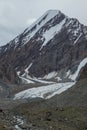 Mountain and glacier view on a popular tourist hike near Bokonbayevo, Kyrgyzstan